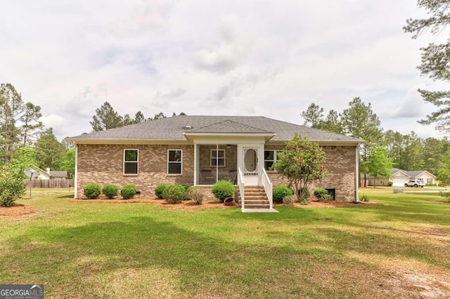 220 Candleberry Way, Guyton, GA 31312 - rear view of property featuring brick siding, a yard, and crawl space