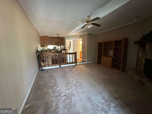 304 Joshua Tree Dr Unit 304, Augusta, GA 30907 - unfurnished living room with a textured ceiling, a ceiling fan, baseboards, and carpet