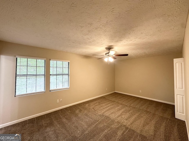 3879 Mcgill Ln, Decatur, GA 30034 - unfurnished room featuring a ceiling fan, a textured ceiling, dark colored carpet, and baseboards