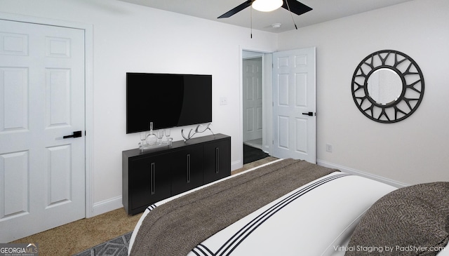 bedroom featuring baseboards, carpet flooring, and ceiling fan