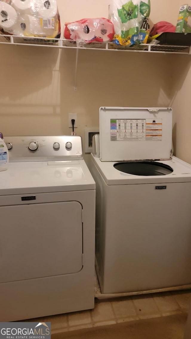 6880 Mountain Cir, Riverdale, GA 30274 - washroom with washing machine and clothes dryer