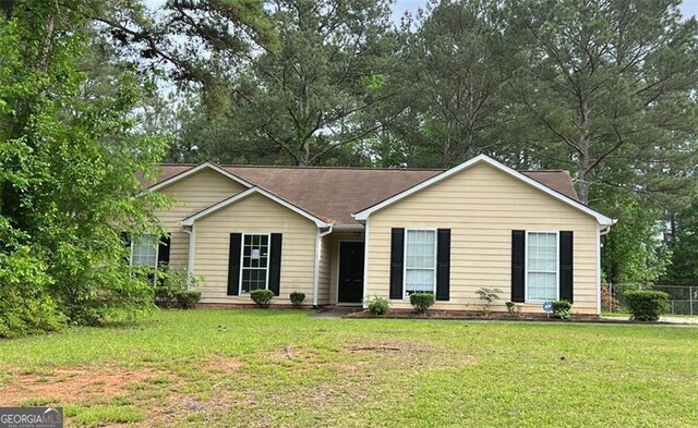 432 Manor Estates Dr, Stockbridge, GA 30281 - ranch-style house featuring view of wooded area