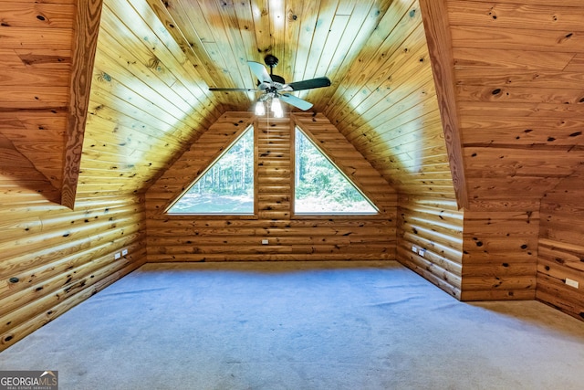 additional living space featuring rustic walls, wooden ceiling, carpet floors, and ceiling fan