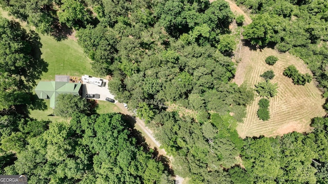 aerial view of property and surrounding area featuring rural landscape