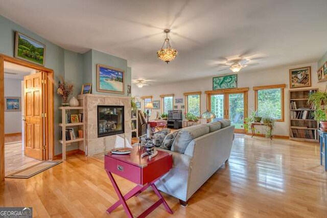 275 Everetts Vw, Blairsville, GA 30512 - living area featuring ceiling fan, wood finished floors, a high end fireplace, and baseboards
