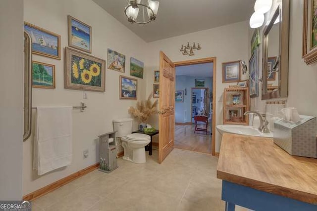 275 Everetts Vw, Blairsville, GA 30512 - bathroom featuring toilet, vanity, a chandelier, and baseboards