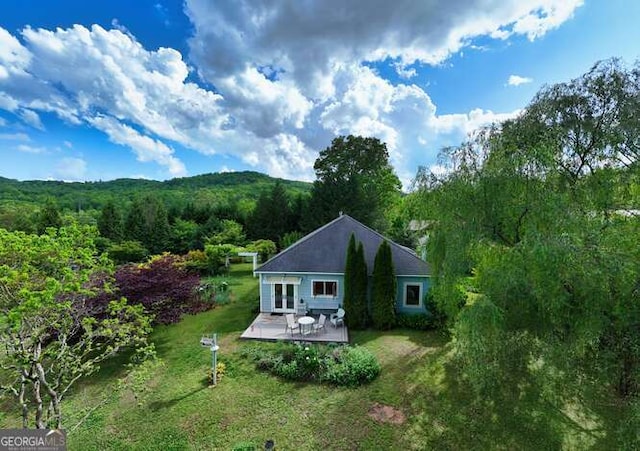 275 Everetts Vw, Blairsville, GA 30512 - back of house featuring a wooded view, a lawn, and a wooden deck
