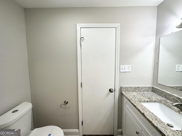 2651 Lois Ln SE, Atlanta, GA 30315 - half bathroom featuring toilet and vanity