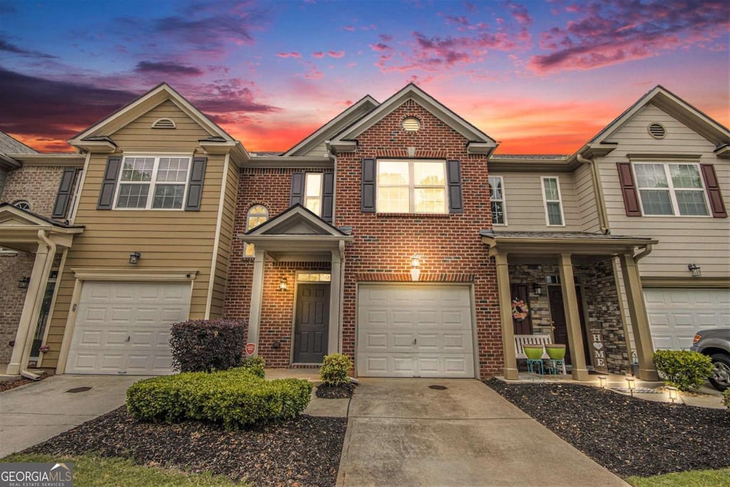 3364 Thornbridge Dr Unit 0, Powder Springs, GA 30127 - view of property with driveway, brick siding, and an attached garage