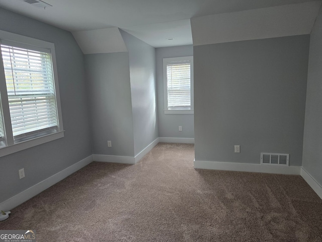 4075 SW Fairburn Ave SW, Atlanta, GA 30331 - spare room with healthy amount of natural light and carpet floors