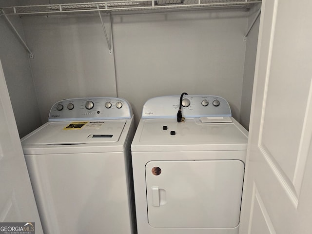 4075 SW Fairburn Ave SW, Atlanta, GA 30331 - washroom with separate washer and dryer
