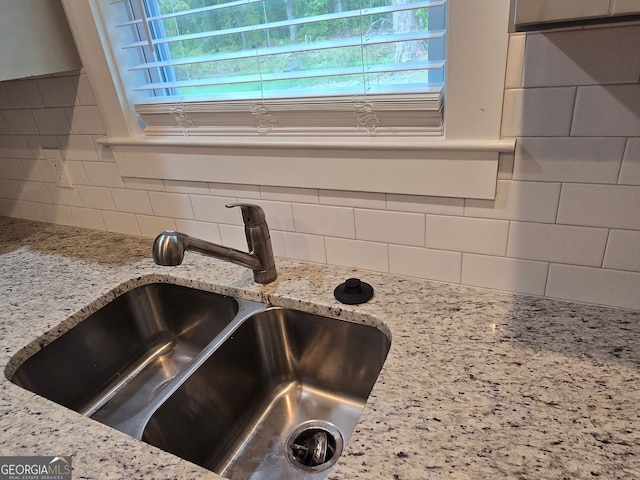 4075 SW Fairburn Ave SW, Atlanta, GA 30331 - kitchen view of backsplash and light stone countertops