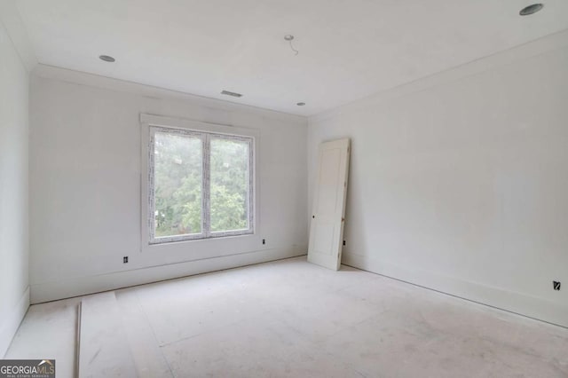 empty room with baseboards