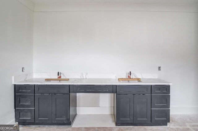 bar featuring a sink