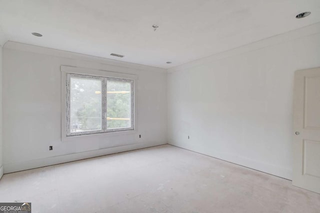 spare room with concrete flooring