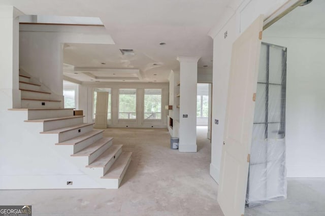 stairway with a raised ceiling