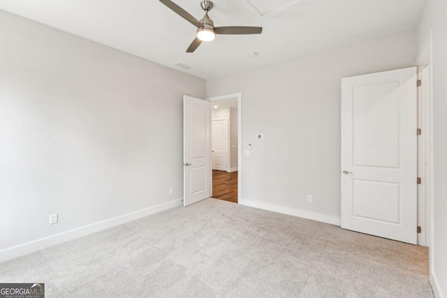 8210 Sonata Ln, Cumming, GA 30041 - unfurnished bedroom featuring carpet floors, baseboards, and a ceiling fan