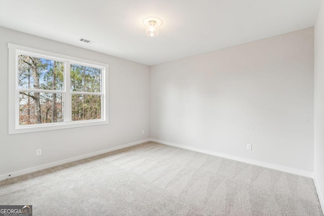 8210 Sonata Ln, Cumming, GA 30041 - empty room featuring carpet floors and baseboards