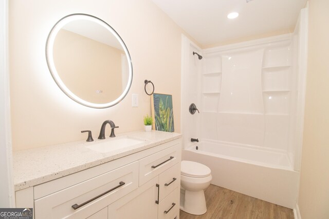 346 Grant Ave, Macon, GA 31201 - full bathroom featuring wood finished floors, toilet, vanity, shower / bathtub combination, and recessed lighting