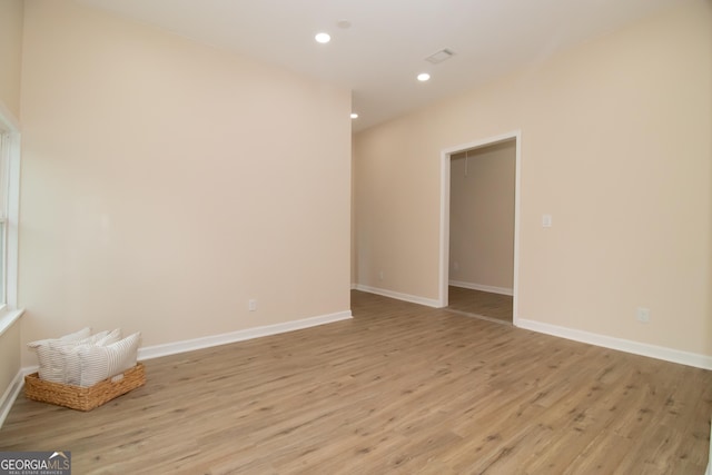 346 Grant Ave, Macon, GA 31201 - empty room with light wood-style flooring, recessed lighting, and baseboards