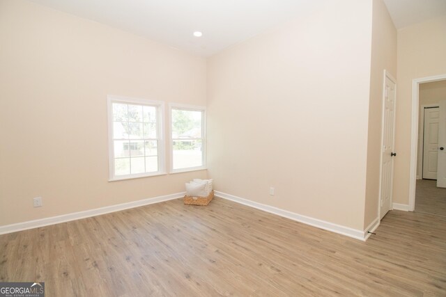 346 Grant Ave, Macon, GA 31201 - unfurnished room with baseboards, light wood finished floors, and recessed lighting