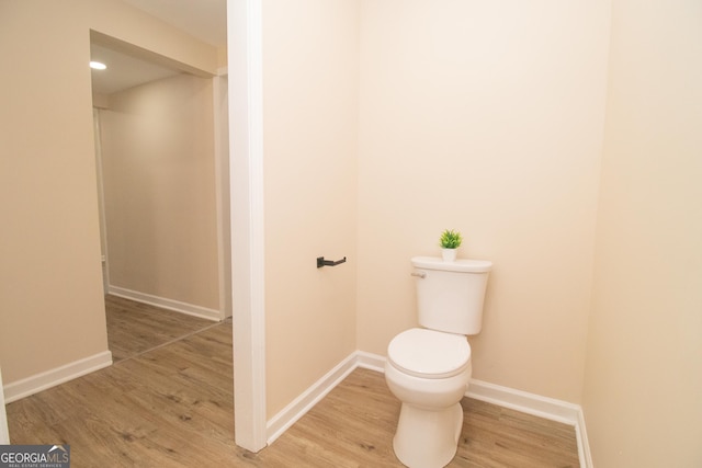 346 Grant Ave, Macon, GA 31201 - bathroom with wood finished floors, baseboards, and toilet