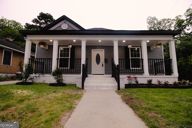 346 Grant Ave, Macon, GA 31201 - view of front of house featuring covered porch and a front lawn