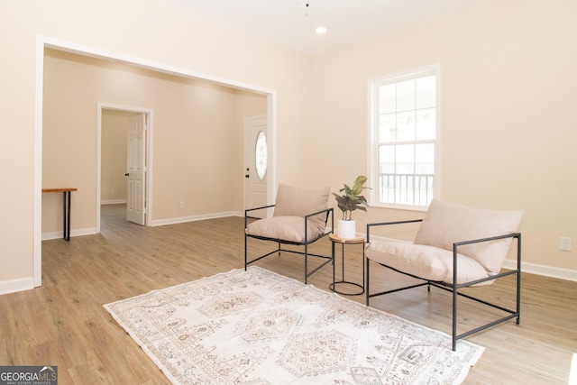346 Grant Ave, Macon, GA 31201 - sitting room with light wood-style floors and baseboards