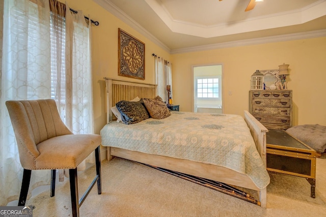 557 Arrowhead Cir, Rutledge, GA 30663 - bedroom featuring carpet flooring, ornamental molding, a tray ceiling, and ceiling fan