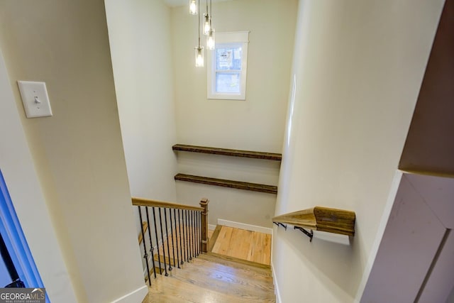 141G Lake Pines Rd, Jackson, GA 30233 - stairway with wood finished floors and baseboards