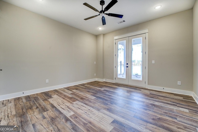 141G Lake Pines Rd, Jackson, GA 30233 - empty room featuring french doors, hardwood / wood-style floors, ceiling fan, baseboards, and recessed lighting