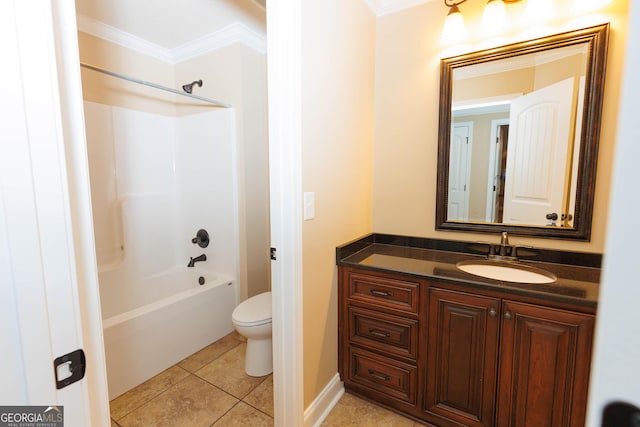 bathroom featuring crown molding, toilet, tub / shower combination, vanity, and tile patterned floors