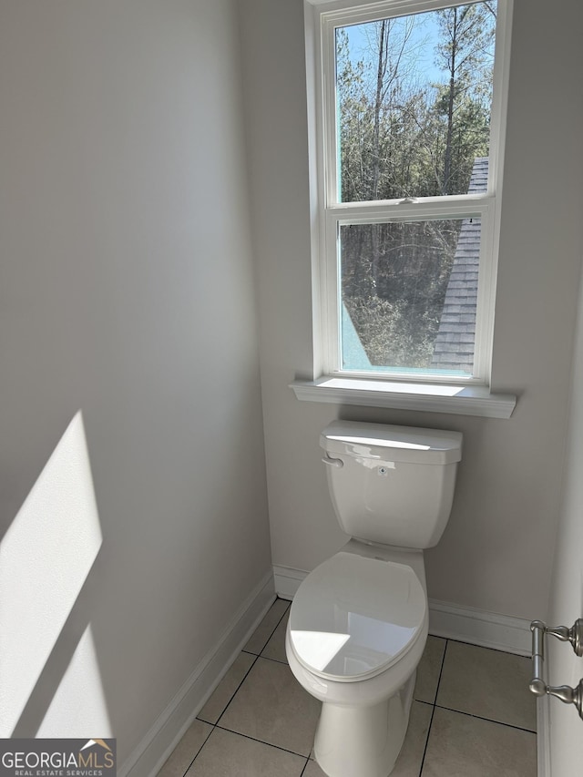 115 Vineyard Walk Lot 76, Carrollton, GA 30117 - bathroom with tile patterned flooring, baseboards, and toilet