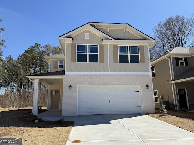 view of front of home featuring brick siding, concrete driveway, a garage, and cooling unit