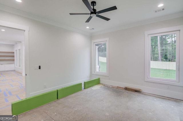 unfurnished room with healthy amount of natural light, a ceiling fan, recessed lighting, and crown molding