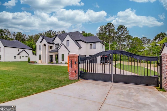 gate featuring a lawn