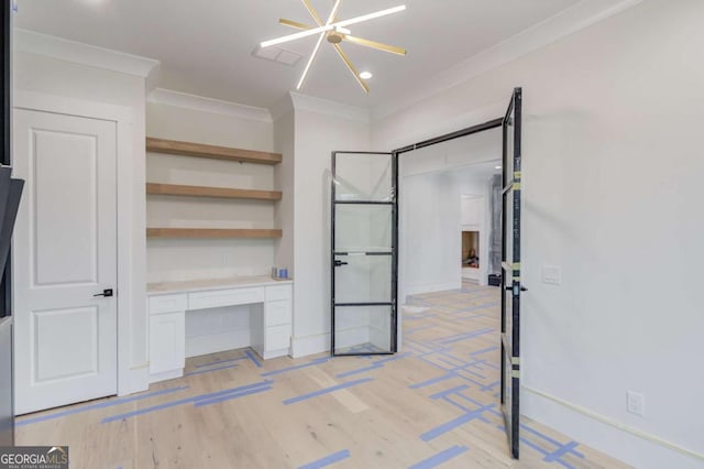 unfurnished bedroom featuring ornamental molding, light wood-style flooring, baseboards, and recessed lighting