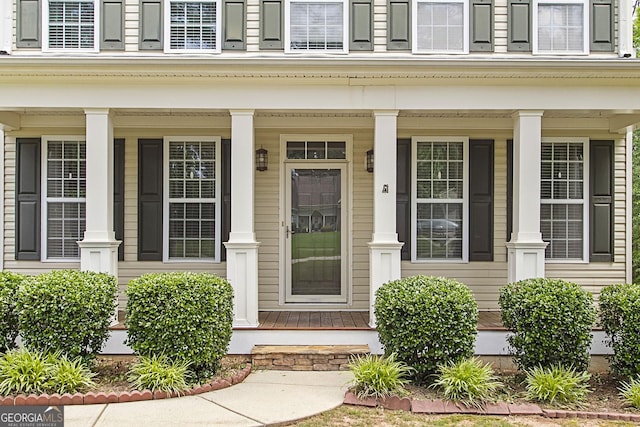 entrance to property with a porch