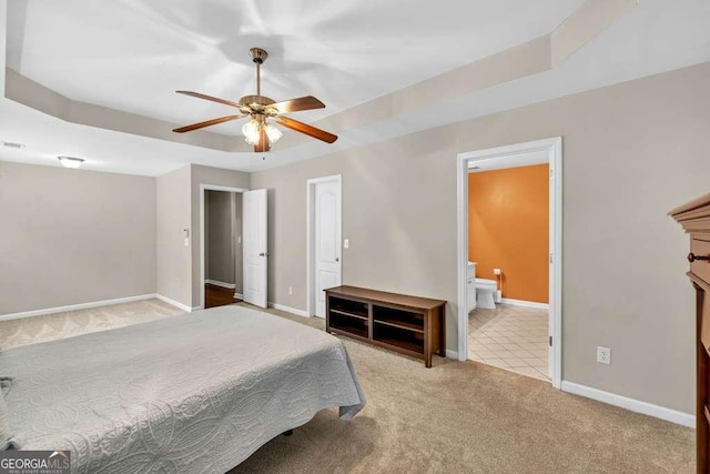 272 Blackberry Ln, Pendergrass, GA 30567 - carpeted bedroom with a raised ceiling, connected bathroom, and ceiling fan