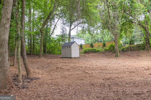 272 Blackberry Ln, Pendergrass, GA 30567 - view of yard featuring a storage shed