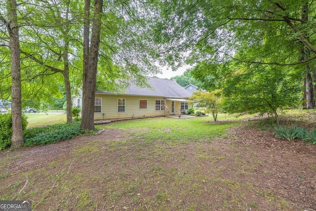 272 Blackberry Ln, Pendergrass, GA 30567 - rear view of house with a lawn
