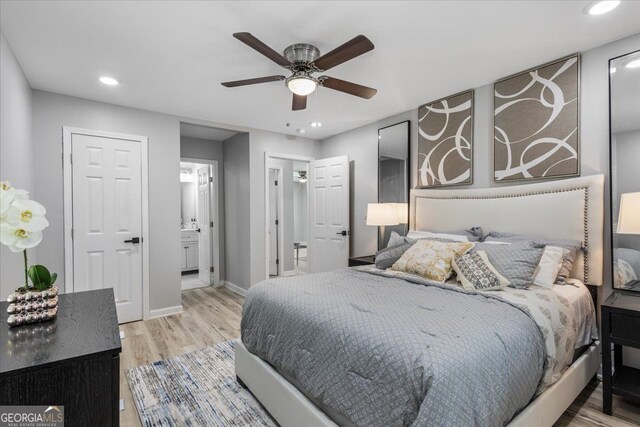 4134 Burgess Dr, Decatur, GA 30035 - bedroom with wood finished floors, recessed lighting, baseboards, connected bathroom, and a ceiling fan
