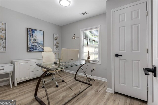 4134 Burgess Dr, Decatur, GA 30035 - office area featuring light wood finished floors and baseboards