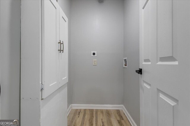 4134 Burgess Dr, Decatur, GA 30035 - washroom featuring hookup for an electric dryer, light wood finished floors, hookup for a washing machine, and baseboards