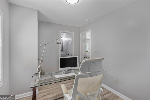 4134 Burgess Dr, Decatur, GA 30035 - office area featuring baseboards and wood finished floors