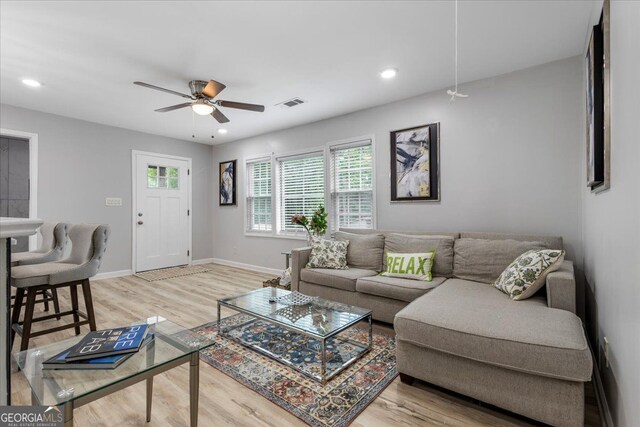 4134 Burgess Dr, Decatur, GA 30035 - living room featuring healthy amount of natural light, light wood-type flooring, ceiling fan, and recessed lighting
