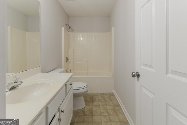 3717 Lockerbie Ln, Powder Springs, GA 30127 - bathroom with toilet, vanity,  shower combination, and baseboards