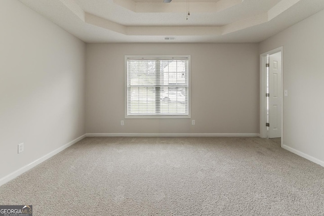 3717 Lockerbie Ln, Powder Springs, GA 30127 - unfurnished room featuring a raised ceiling, carpet floors, ceiling fan, and baseboards