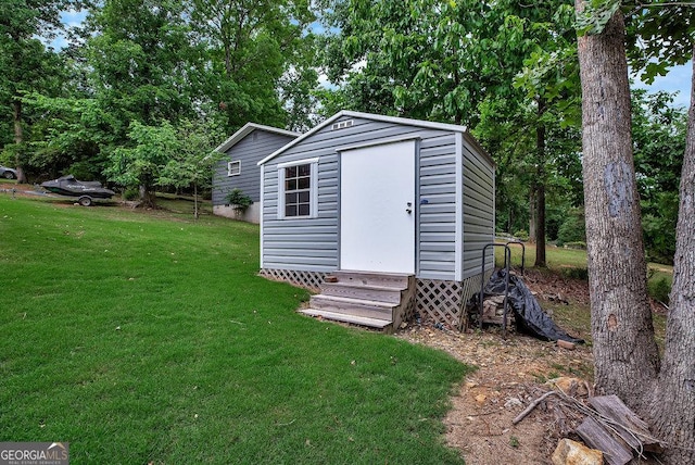 view of shed featuring entry steps and view of scattered trees