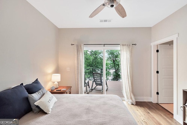 bedroom featuring light wood-style floors, access to exterior, baseboards, and a ceiling fan